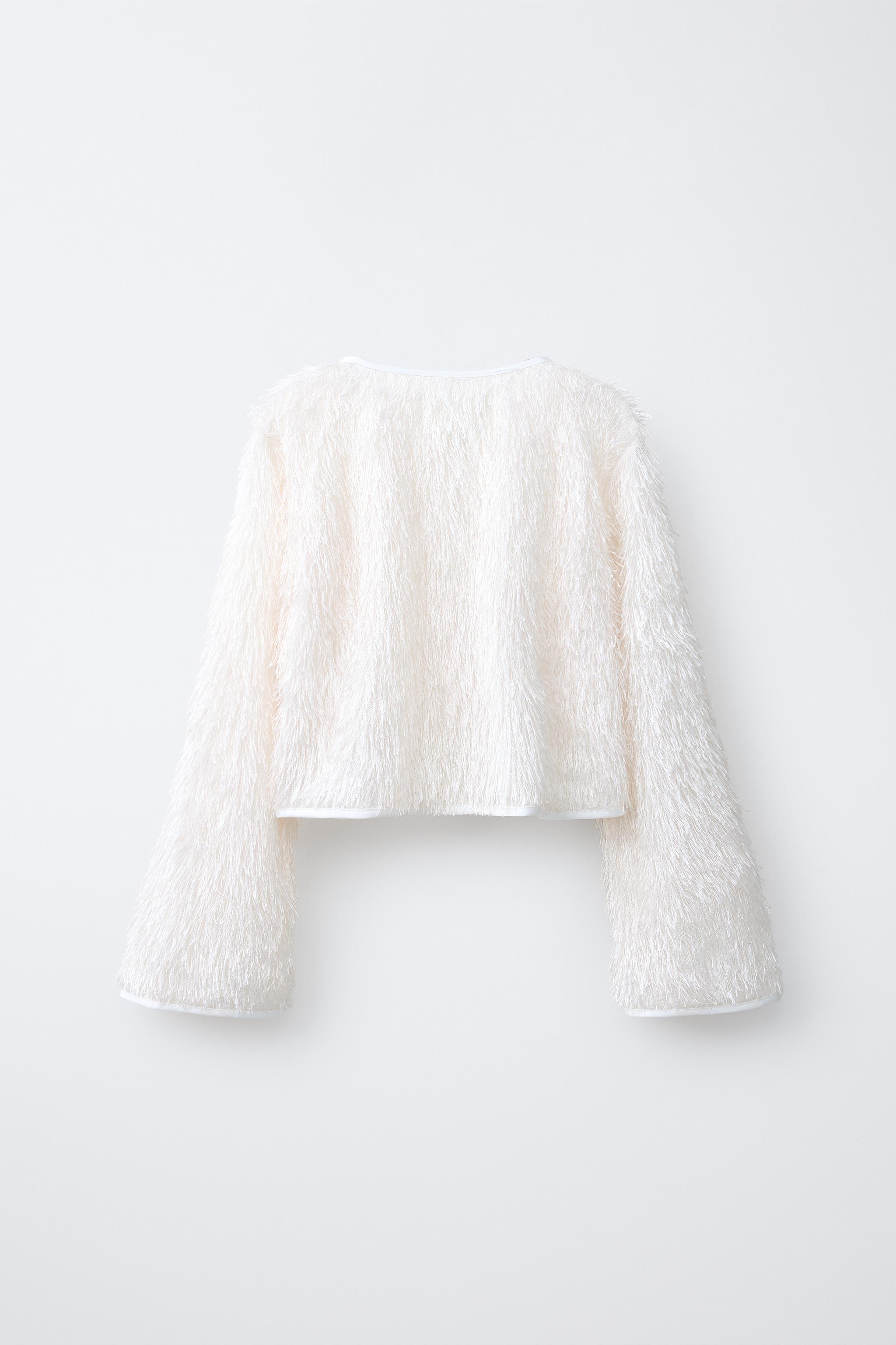 FRINGED JACKET